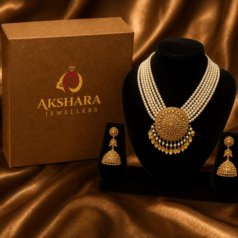 Gold necklace and matching earrings presented as a jewellery gift