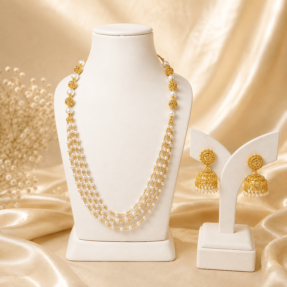 Gold necklace and earrings displayed as examples of jewellery customers can bring for assessment